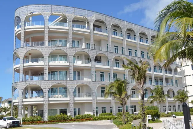 This condo property in the Bahamas keeps its exterior looking bright with W-1650 Bonding Primer and a custom Silver Birch Mica color of NeverFade Metal Topcoat.